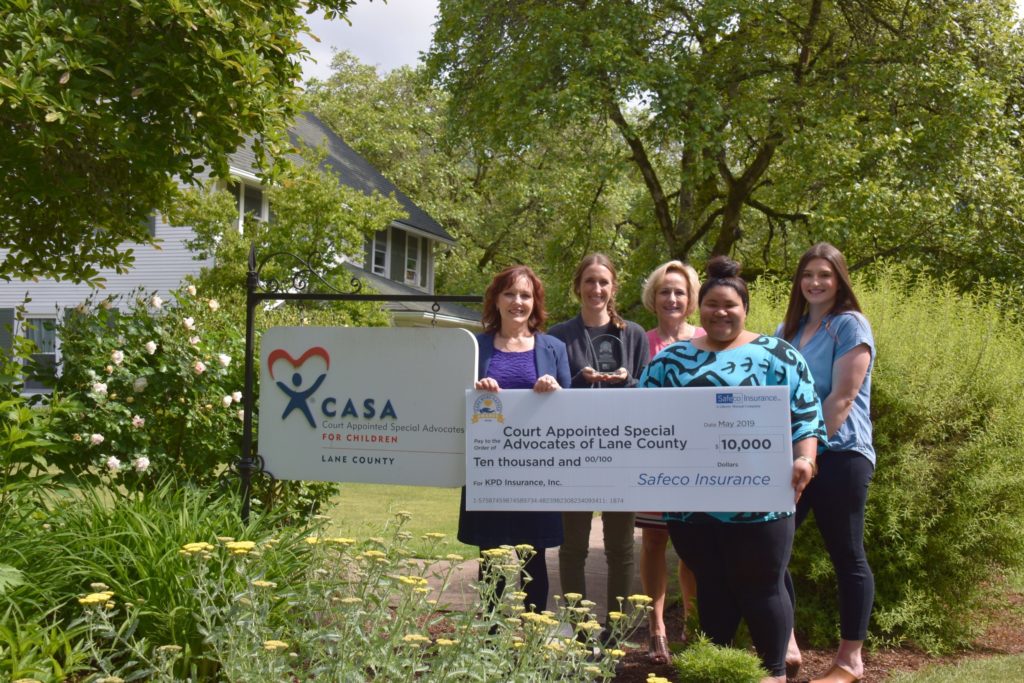 KPD Insurance and CASA of Lane County check presentation