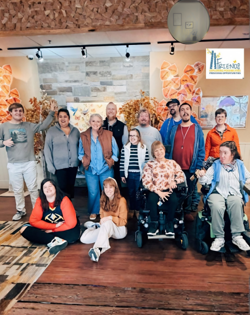 This photo was taken in November 2025 at FRIENDS of Broomfield, Inc. in Broomfield, Colorado. Pictured are Sara Hoffman, Managing Partner, and Aaron Hoffman, Managing Partner, alongside FRIENDS participants during the organization’s Friendsgiving celebration.
