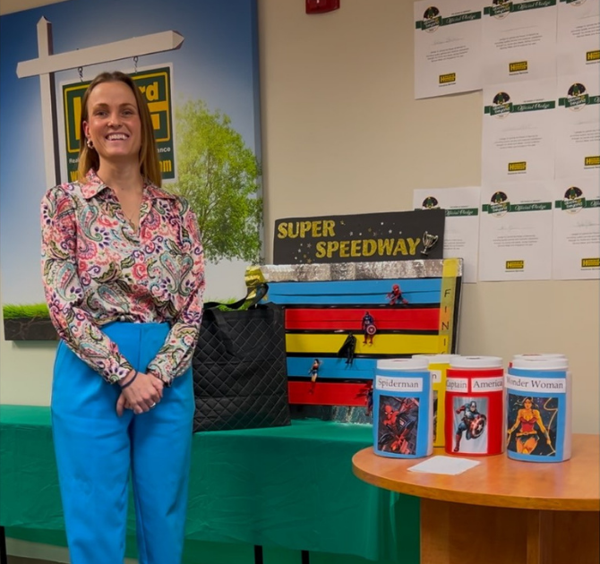 Danielle Shearer, VP and General Manager of the agency is featured in this photo. This photo was taken in May of 2025. This shows the raffle and drawing we conducted for the winner of the 50/50 to benefit the Howard Hanna Children's Free Care Fund.